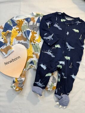 Carter's - pair of newborn fleece sleepers w/ 2-way zippers.
